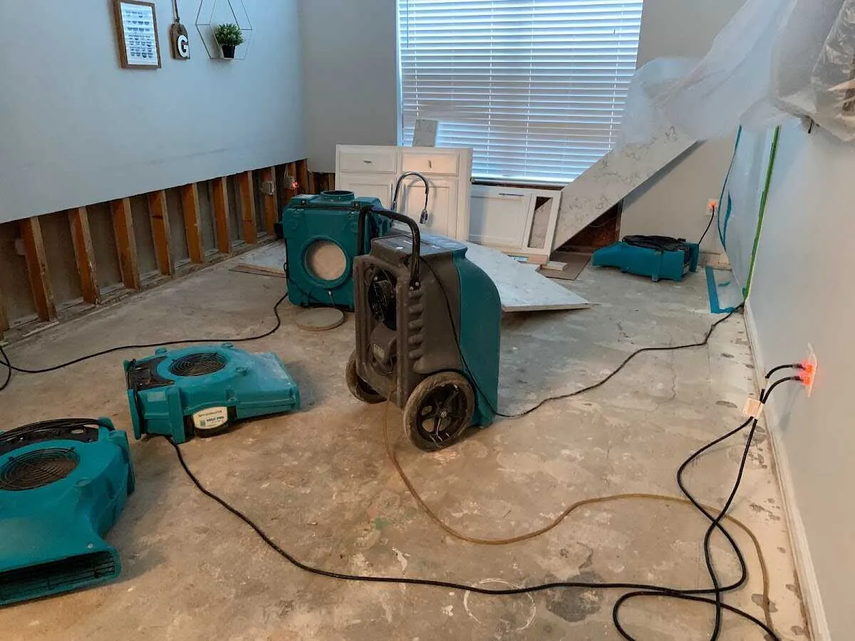 Dehumidifier in flood-cut room for Water Damage Restoration in Fort Thomas